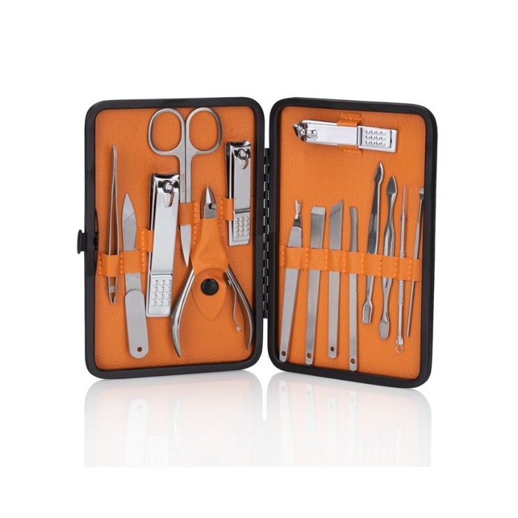 Набір з 15 косметичних аксесуарів для manicure , pedicure та догляду за обличчям в чорно-коричневому футлярі